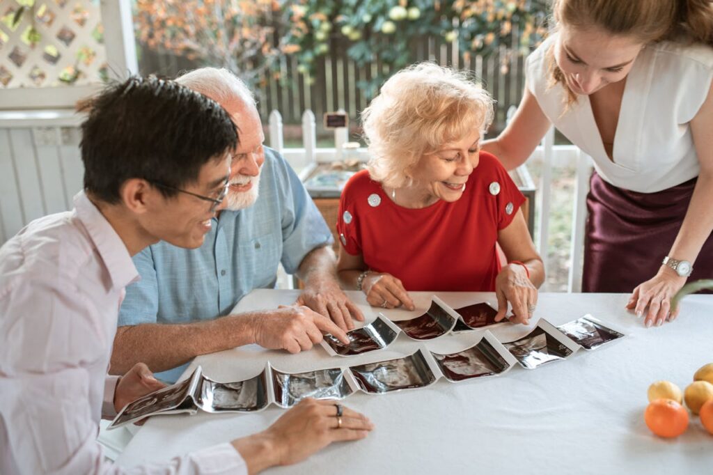 Family looking at old photos